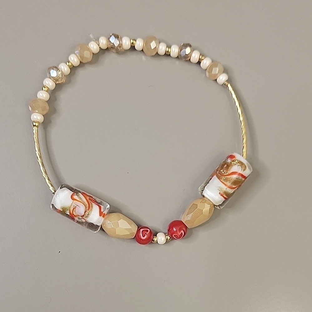 Handcrafted Beaded Bracelet with Red and Beige Accents